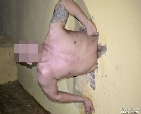 زندانی هنگام فرار در سوراخ دیوار گیر کرد+تصاویر