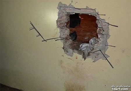 زندانی هنگام فرار در سوراخ دیوار گیر کرد+تصاویر